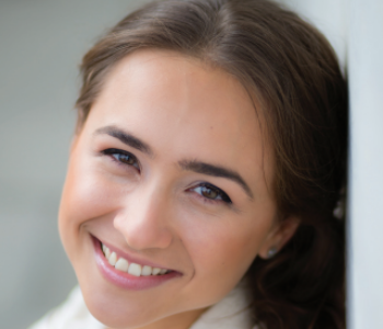 close up headshot of a young woman